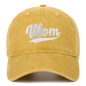 Close-up of white Mom embroidery on a yellow vintage washed cotton baseball cap