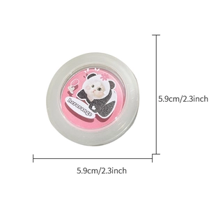 Detailed top view of compact peach blush in clear case with a 5.9cm diameter size mark