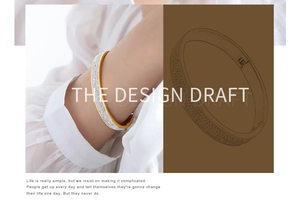 Detail view of gold-plated bangle with pavé zircons and creative design draft overlay