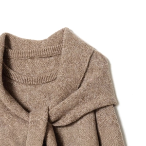 Chic light brown knit sweater featuring a stylish shawl collar and soft wool texture