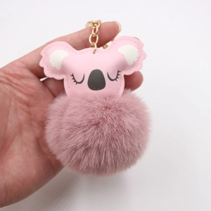 Pink koala pompom keychain with soft faux fur ball and gold metal chain link