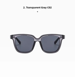 Front view of transparent grey oversized sunglasses with dark lenses for driving and style