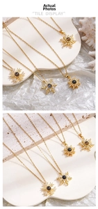 Close-up of golden snowflake necklace with projection stone and zircon details