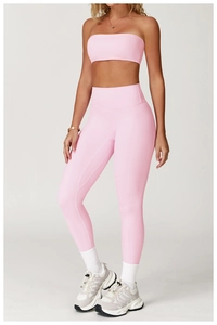 Detailed view of pink brushed high-waisted yoga leggings and strapless sports bra set