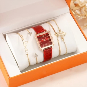 Women's square red dial watch set with three gold bracelets in an orange gift box