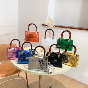 Selection of colorful patent leather crossbody bags with embossed crocodile texture