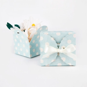 Light blue polka dot gift box with white ribbon bow for handmade soap and party favors