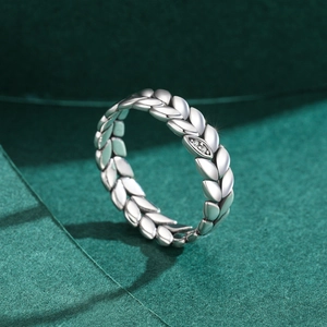 S925 silver leaf ring with zircon stones featuring a lucky wheat ear design on green background