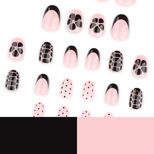 Faux ongles courts ronds avec pointes French noires, pois et motifs floraux