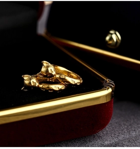 Macro shot of gold-plated S925 silver leopard ring with detailed relief textures