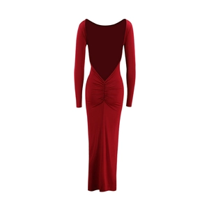 Detail view of the backless design and ruched detail on a dark red bodycon maxi dress