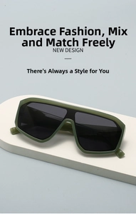Detail of fashion shield sunglasses with dark green frame and polarized grey lenses