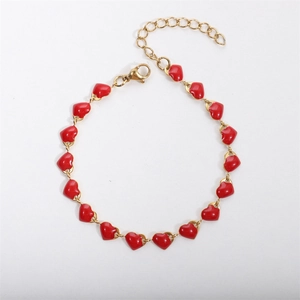 18k gold plated stainless steel bracelet with red enamel heart charms and lobster clasp