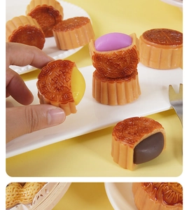 Makroaufnahme von realistischen Mondkuchen-Modellen aus PVC mit detaillierter Textur und Füllung