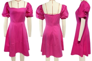 Detail view of fuchsia puff sleeve dress featuring a square neck and A-line silhouette