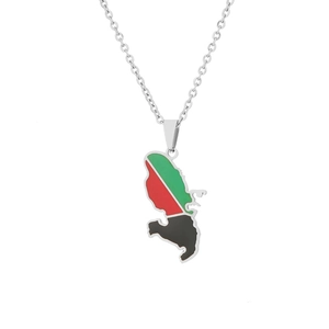 Detail view of silver Martinique map pendant with vibrant red, green, and black enamel inlay