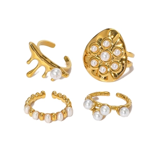 Four-piece 18K gold plated stainless steel ring set with irregular pearls and minimalist design