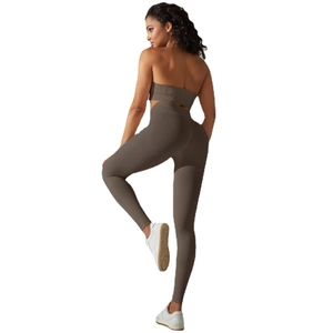 Seamless ribbed yoga set with halter bra and high waist leggings in taupe color
