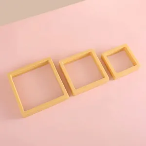 Set of three yellow PE film suspension frames for jewelry and gemstone display