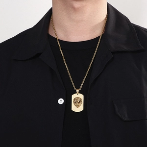 Collier hip hop pendentif tête de lion doré avec strass et chaîne torsadée homme