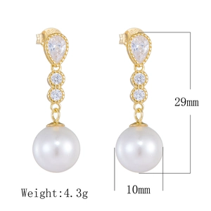 Detail showing 29mm drop earrings with 10mm pearls and S925 sterling silver hallmark