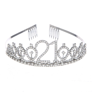Close-up of silver 21st birthday crown with sparkling rhinestones and secure combs