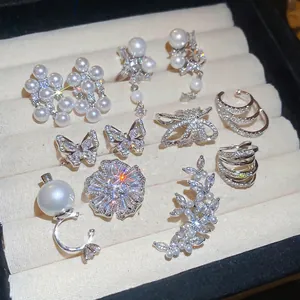 Elegant Korean style pearl and zircon ear cuff set with butterfly ring in a jewelry box