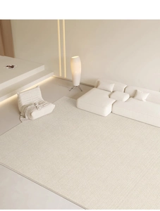 Top view of a cream waterproof living room carpet with modern minimalist sofa and chair