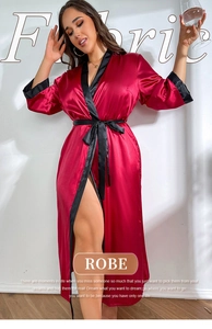 Detail view of burgundy satin robe with black silk trim and adjustable waist belt