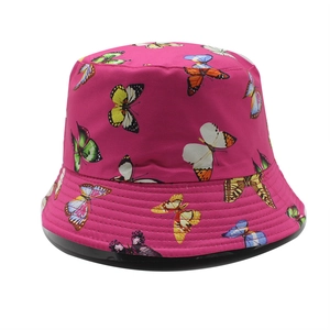 Rose red cotton bucket hat with colorful butterfly print and reinforced stitched brim
