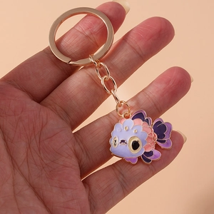Cute cartoon koi fish keychain in purple and blue enamel with gold metal link chain