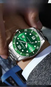 Close-up of Camidu luxury green dial steel watch with calendar and luminous markers