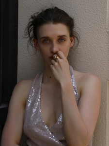 Detail of 18K gold-plated double butterfly pearl open ring on model with sequined top