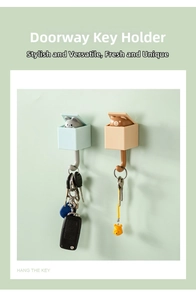 Wall-mounted cat and bear popup adhesive hooks for hanging keys in entryway