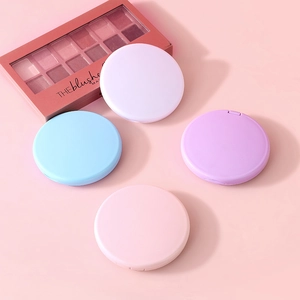 Lot de quatre miroirs de poche ronds aux tons pastel rose, bleu et lavande doux
