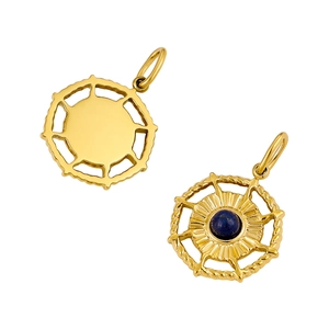 Macro view of stainless steel pendant with blue stone inlay and hollow pattern back