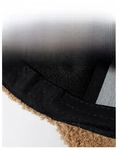 Detail of widened sweatband on winter fleece baseball cap with moisture-wicking fabric