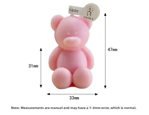 Macro shot of cute pink bear candle with dimensions showing 47mm height and 33mm width