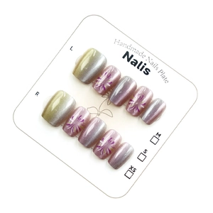 Handmade gradient cat eye press-on nails with purple floral art on 10pcs white display card