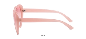 Side view of heart shaped pink polarized sunglasses with gradient lenses for women