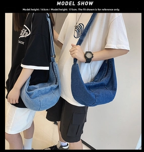 Detailed comparison of light and dark blue denim crossbody bags with adjustable straps