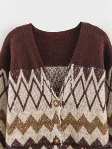 Close-up of retro geometric jacquard knit cardigan with V-neck and button detailing