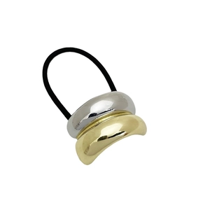 Two-tone geometric metal ponytail holder with gold and silver plates on elastic hair tie