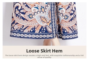 Detail of bohemian paisley print hem with intricate border on a vintage V-neck maxi dress