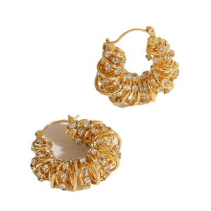 Luxurious 14K gold-plated C-shaped twist hoop earrings with sparkling zircon stones
