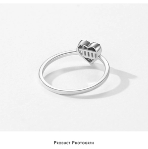 Detailed view of S925 silver heart ring featuring unique hollow striped design