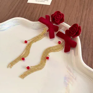 Elegant red flocked rose earrings with velvet bow and golden crystal tassels for women