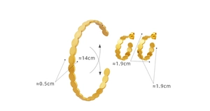 Detail view of gold stainless steel jewelry set featuring oval link cuff and C-shaped earrings