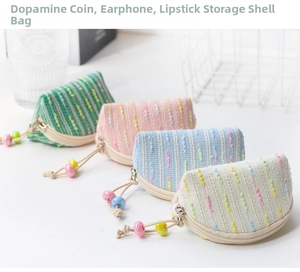 Group of colorful shell-shaped mini pouches for coins, earphones and lipstick storage