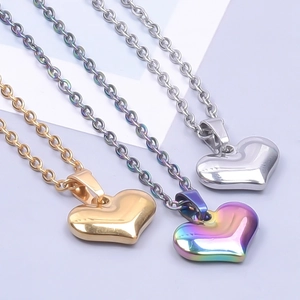 Minimalist heart pendant necklace in gold silver and iridescent stainless steel finishes